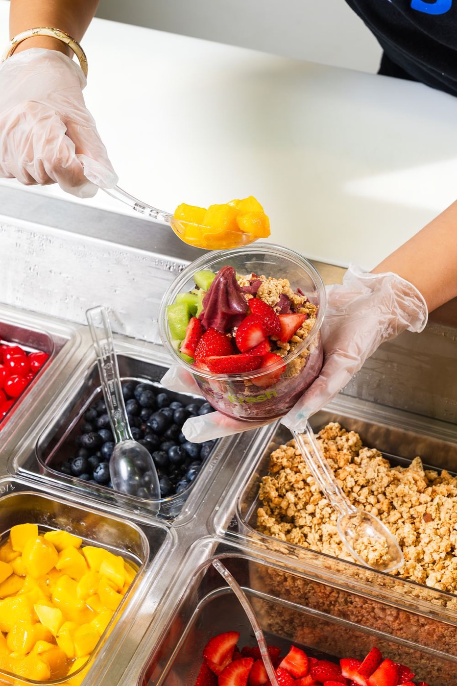 A spread of fresh fruit and toppings